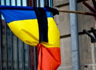 Instituțiile din Olt vor arbora drapelul în bernă