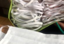 O femeie din Brebeni, speculă cu măști. Cerea șase lei pe una