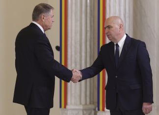 Klaus Iohannis i-a predat mandatul lui llie Bolojan