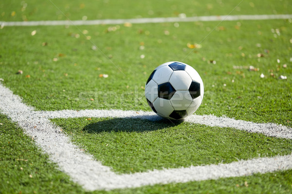 8571720_stock-photo-soccer-ball-on-football-field